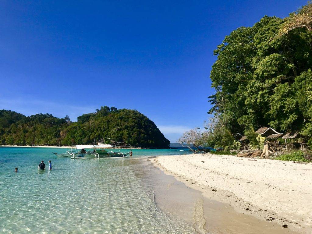 Palawan Travel Guide: Island hopping tour beach Port Barton Palawan Philippines