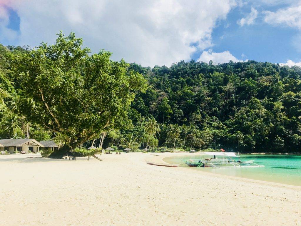 Beach and kayaks at Secret Paradise Resort & Turtle Sanctuary Port Barton Palawan Philippines