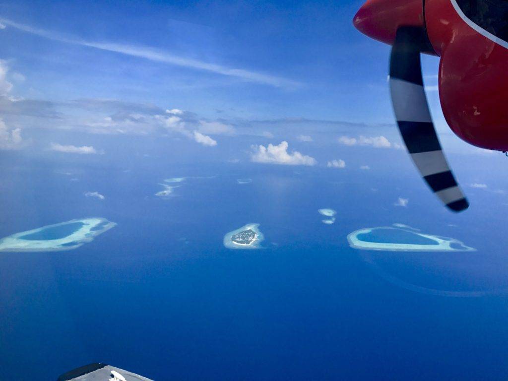 Mirihi Island Resort Maldives seaplane transfer views