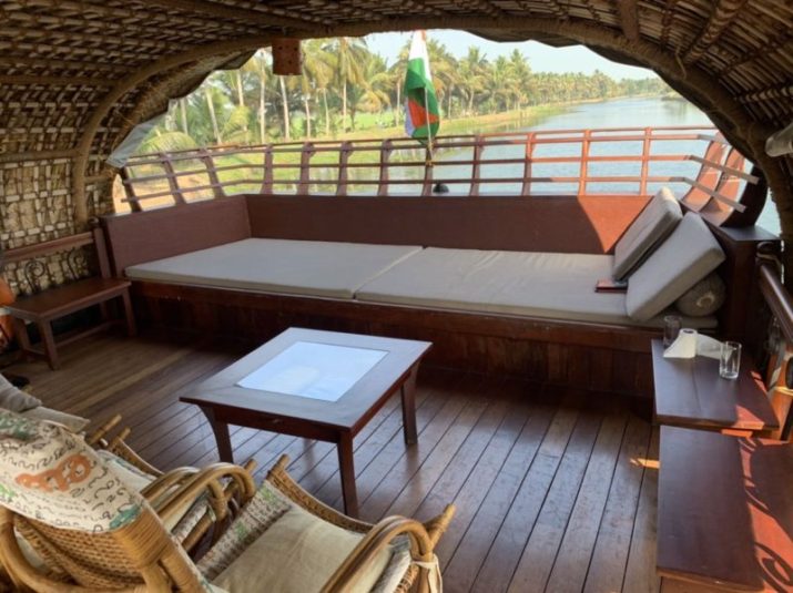 Upper deck lounge area on Xandari Riverscapes luxury houseboat